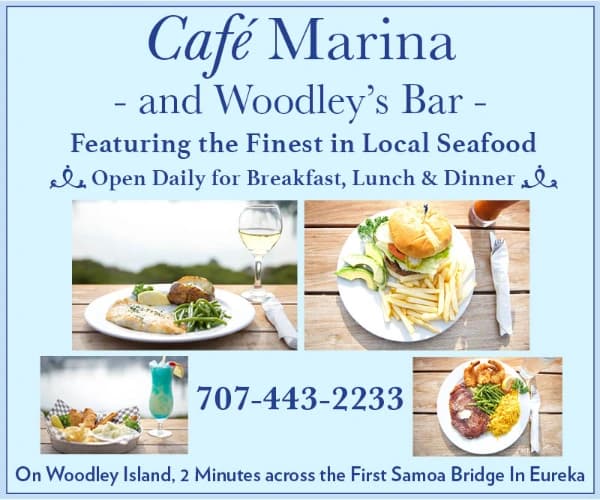 Café Marina sign with menu photos; text: “Café Marina - and Woodley’s Bar - Featuring the Finest in Local Seafood”